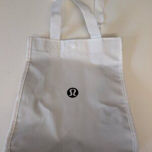 Lululemon White Shopping Bag with Yoga Logo and Straps (9 x 12 x 4)